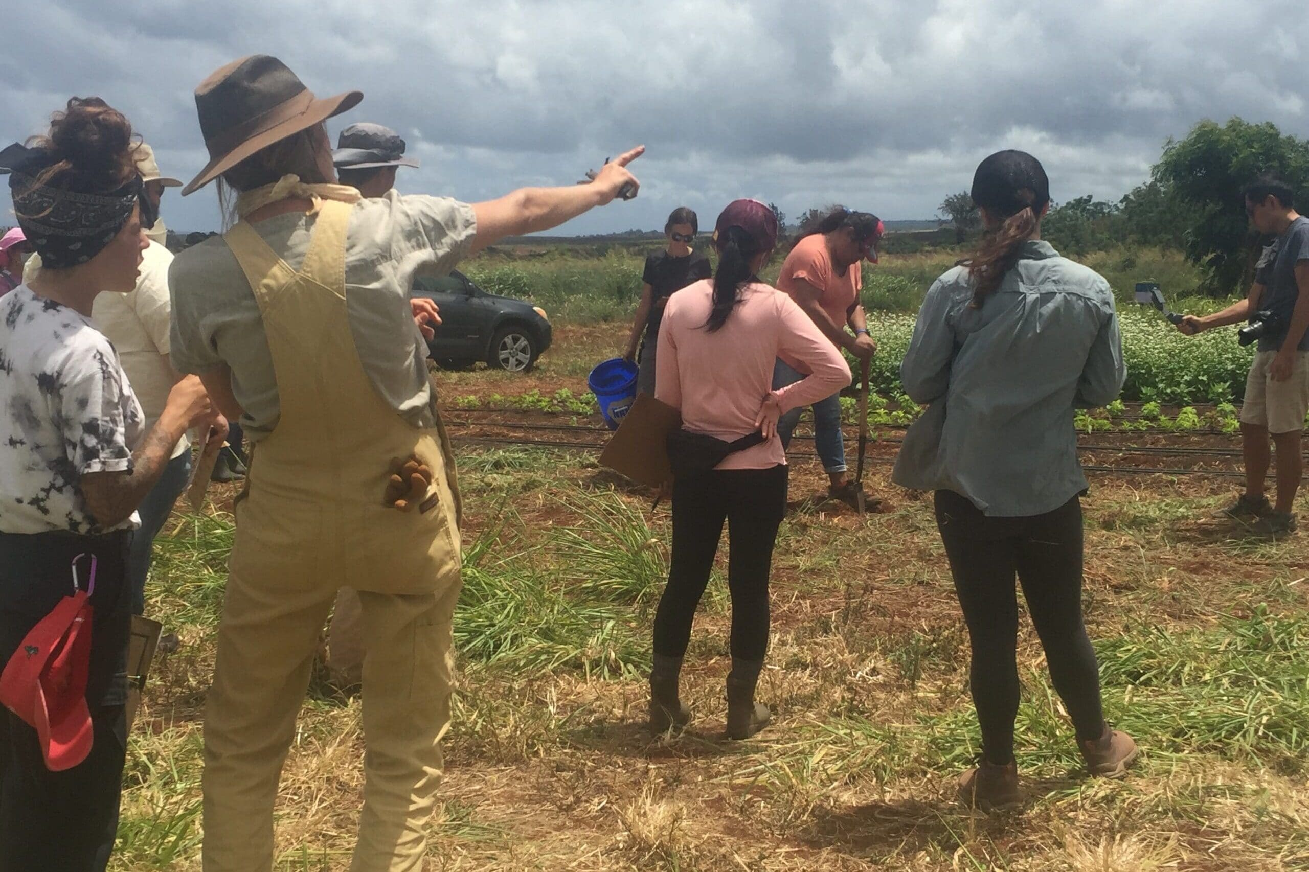 people gathered at a workshop in hua orchards